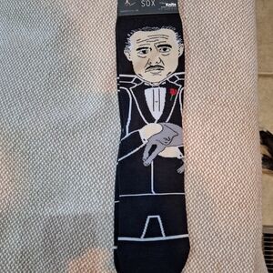 A pair of NWT Odd Sox "the Godfather" knits. NWT